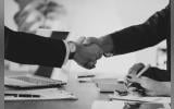 Two people shaking hands