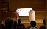 female business executive giving presentation