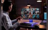 office worker using videocall conference to meet with business people on webcam