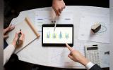 business people working with ipad