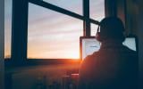 man-sitting-facing-monitor