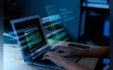 Programming background with person working with codes on computer