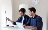 Colleagues discussing work project