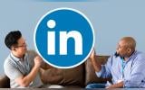 People holding a Linkedin logo