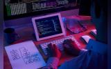 Professional programmer working late in the dark office