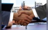 two hands of professionals shaking hands and different values in connection with governance