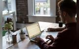 Man at a laptop in an office