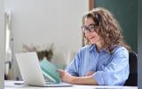 woman looking at paper