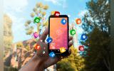 Hand holding smartphone social media concept