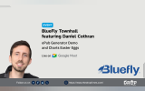 A wide event graphic shows Daniel Cothran beside the BlueFly logo and promotes a townhall featuring an ePub Generator demonstration and Charts Easter eggs. Text reads "EVENT. BlueFly Townhall featuring Daniel Cothran. ePub Generator Demo and Charts Easter Eggs. Live on Google Meet. Bluefly. Follow us on. LinkedIn. Facebook. Reddit. X. https www.thedroptimes.com. THE DROP TIMES."