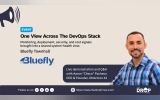 Townhall event graphic with a portrait of Aaron Pacheco in a blue plaid shirt beside Bluefly branding. Text reads "EVENT". "One View Across The DevOps Stack". "Monitoring deployment security and cost signals brought into a shared system health view". "Bluefly Townhall". "Bluefly". "Live demonstration and Q and A with Aaron Checo Pacheco CEO and Founder Ottermon AI".