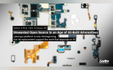 A blurred arrangement of disassembled electronic circuit boards and smartphone components forms the background of The Drop Times newsletter graphic. The text reads "Editor’s Pick. Vol. 4 Issue 43. Stewarded Open Source in an Age of AI-Built Alternatives. Leaving a platform is only the beginning. Can its replacement support the work that depends on it?" The Drop Times logo appears in the bottom right corner.